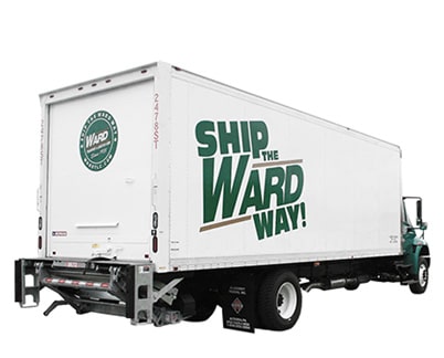 side view of tractor trailer with "Ship the Ward Way"