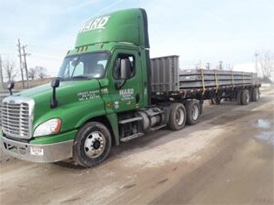 Dedicated Freight Solutions - Green Cab and Long Load 